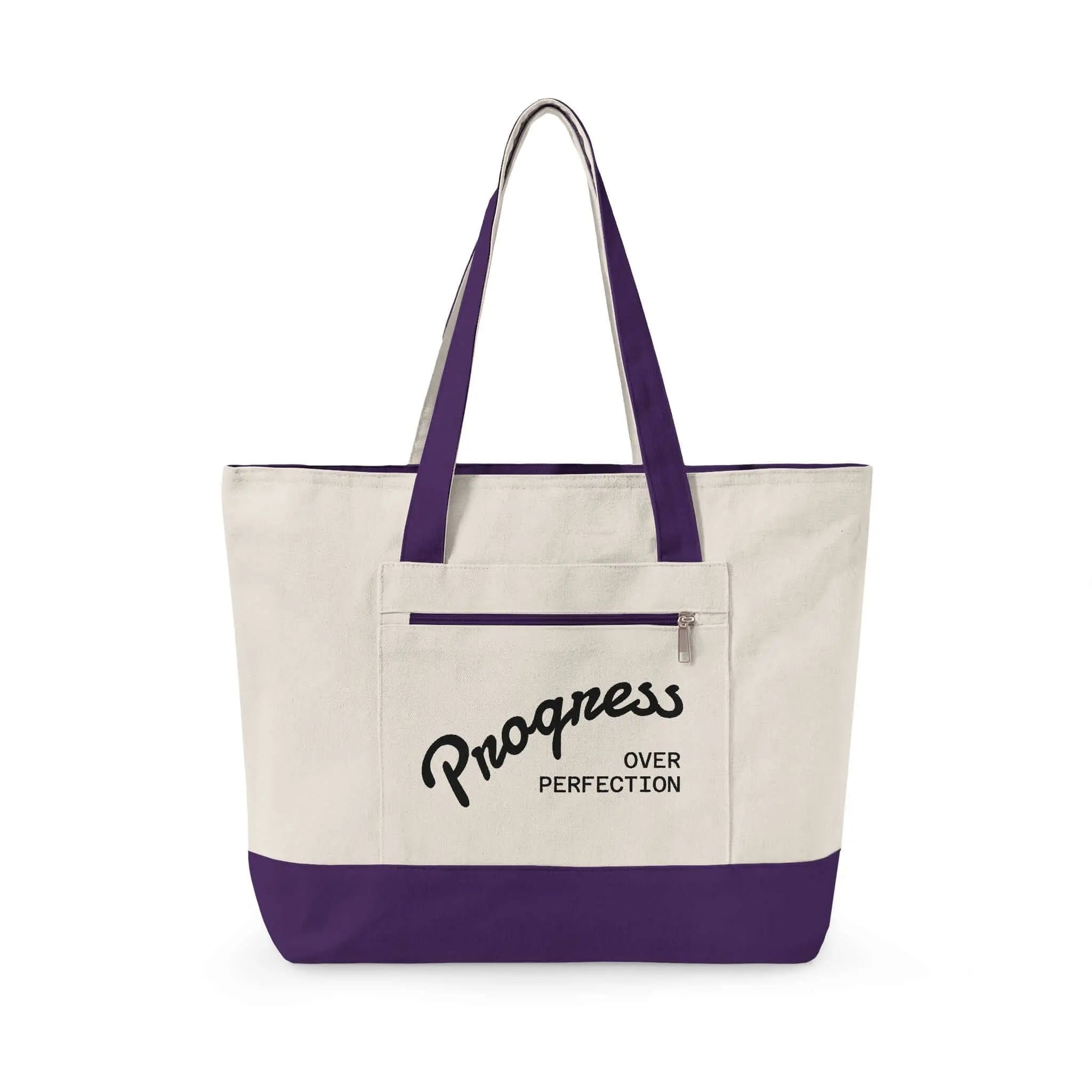 Progress Over Perfection Tote Bag |Minimalist canvas tote bag with black straps and zipper pocket featuring the motivational quote “Progress Over Perfection” in bold black typography on a neutral cream background.